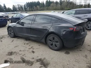 2023 Tesla Model 3 with VIN 5YJ3E1EA3PF644898, listed as a Copart auction lot 50427685 with 36,488 mi miles and Salvage Title. Bid and sale history available at DreamBid. Image 2.