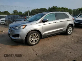 2021 Ford Edge Titanium with VIN 2FMPK4K91MBA12380, listed as a Copart auction lot 59275785 with 82,295 mi miles and Salvage title. Bid and sale history available at DreamBid. Image 1.