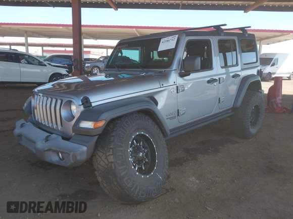 2019 Jeep Wrangler Unlimited Sport S z VIN 1C4HJXDG7KW557682, wystawiony jako IAAI lot #42586742 z przebiegiem 49 741 mil mil oraz . Historia ofert i sprzedaży dostępna na DreamBid. Obrazek 2.