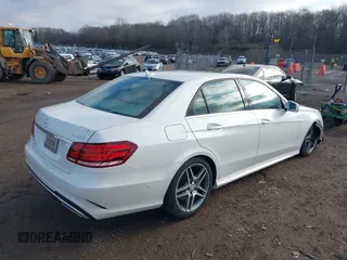 2014 Mercedes-Benz E 550 Sport with VIN WDDHF9BB5EA949457, listed as a IAAI auction lot 41128583 with 99,248 mi miles and . Bid and sale history available at DreamBid. Image 4.