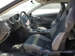 2003 Toyota Celica GT z VIN JTDDR32TX30165929, wystawiony jako Copart lot #59123525 z przebiegiem 222 623 mil mil oraz Szkoda całkowita • Salvage title. Historia ofert i sprzedaży dostępna na DreamBid. Obrazek 7.