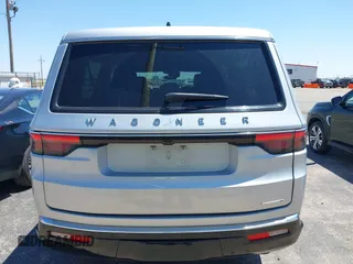 2024 Jeep Wagoneer Series II z VIN 1C4SJSBP8RS105303, wystawiony jako IAAI lot #42503456 z przebiegiem 52 664 mil mil oraz . Historia ofert i sprzedaży dostępna na DreamBid. Obrazek 16.