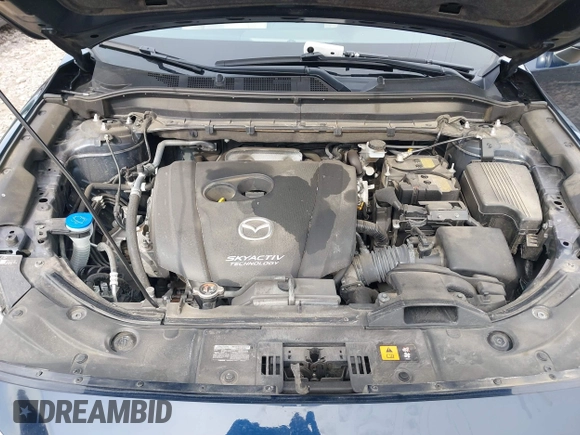 2019 Mazda CX-5 Touring with VIN JM3KFBCM5K0689948, listed as a IAAI auction lot 41976266 with 74,812 mi miles. Bid and sale history available at carsss.com. Image 10.
