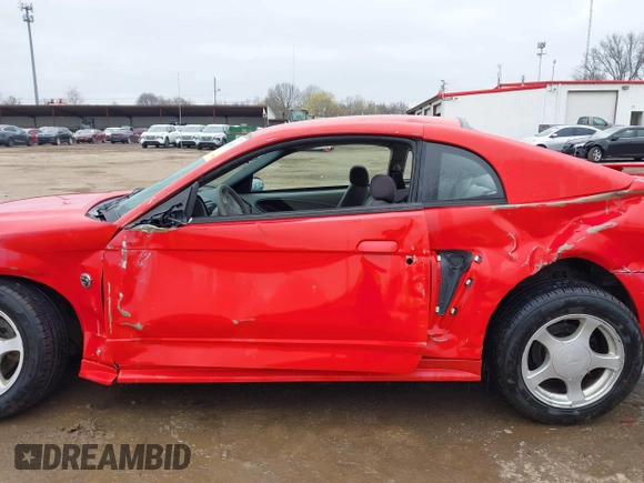 2004 Ford Mustang Standard z VIN 1FAFP40684F238897, wystawiony jako IAAI lot #42020163 z przebiegiem 156 836 mil mil oraz . Historia ofert i sprzedaży dostępna na DreamBid. Obrazek 14.