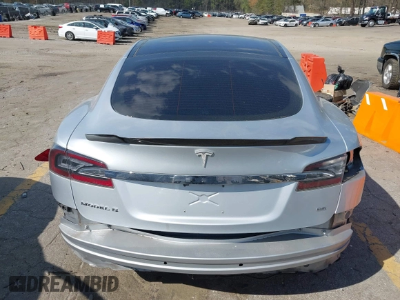2014 Tesla Model S 60 z VIN 5YJSA1H16EFP28486, wystawiony jako IAAI lot #41887484 z przebiegiem 99 271 mil mil oraz . Historia ofert i sprzedaży dostępna na DreamBid. Obrazek 16.