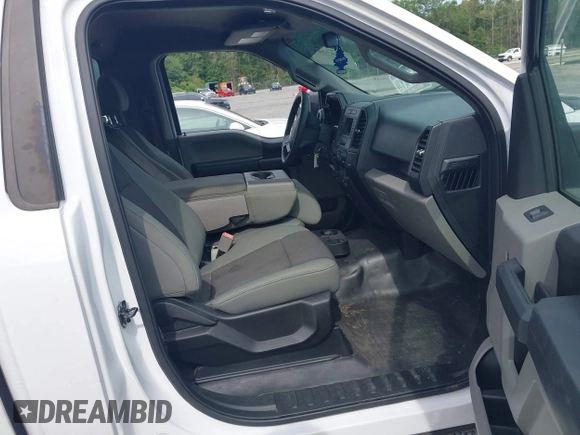 2018 Ford F-150 XL with VIN 1FTMF1CB3JKE51738, listed as a IAAI auction lot 42387561 with 110,951 mi miles and . Bid and sale history available at DreamBid. Image 5.