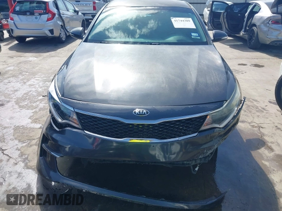 2016 Kia Optima LX Turbo with VIN 5XXGT4L12GG030448, listed as a IAAI auction lot 41744309 with 110,375 mi miles. Bid and sale history available at carsss.com. Image 12.