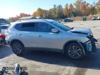 2016 Nissan Rogue SV with VIN KNMAT2MV6GP733975, listed as a IAAI auction lot 40775934 with 68,718 mi miles and . Bid and sale history available at DreamBid. Image 14.