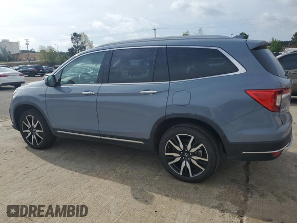 2022 Honda Pilot Touring 7-Passenger z VIN 5FNYF5H69NB031540, wystawiony jako Copart lot #51661185 z przebiegiem 58 316 mil mil oraz Szkoda całkowita • Salvage title. Historia ofert i sprzedaży dostępna na DreamBid. Obrazek 2.