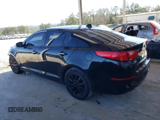 2015 Kia Optima EX with VIN 5XXGN4A72FG444555, listed as a Copart auction lot 88497455 with 176,229 mi miles and Salvage Title. Bid and sale history available at carsss.com. Image 2.