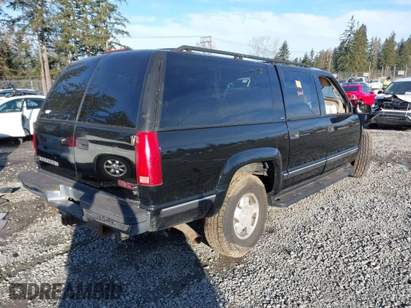 1999 GMC Suburban with VIN 3GKFK16R2XG524342, listed as a IAAI auction lot 41682292 with 161,536 mi miles and . Bid and sale history available at DreamBid. Image 4.