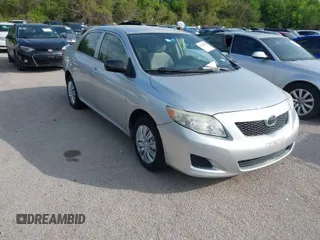 2009 Toyota Corolla with VIN 1NXBU40E19Z027967, listed as a IAAI auction lot 41922518 with 117,115 mi miles. Bid and sale history available at carsss.com. Image 1.
