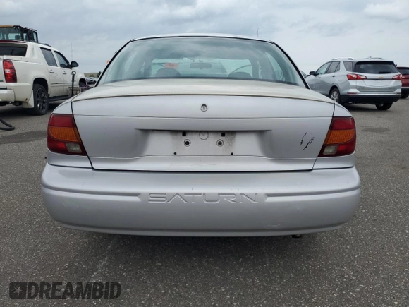 2000 Saturn SL с VIN 1G8ZG5284YZ152285, выставлен на аукционе Copart как лот 59344165 с пробегом Не указан миль и Списание • Salvage title. История ставок и продаж доступна на DreamBid. Изображение 6.