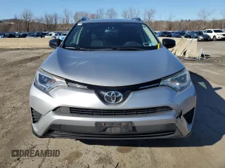 2016 Toyota RAV4 LE with VIN 2T3BFREV4GW451616, listed as a Copart auction lot 50143575 with 128,034 mi miles and Salvage Title. Bid and sale history available at DreamBid. Image 5.