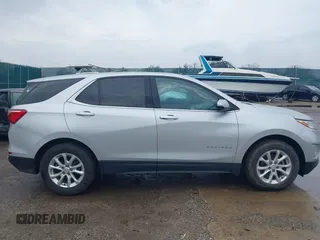 2019 Chevrolet Equinox LT z VIN 2GNAXJEV0K6224557, wystawiony jako IAAI lot #41946724 z przebiegiem 179 748 mil mil oraz . Historia ofert i sprzedaży dostępna na DreamBid. Obrazek 13.