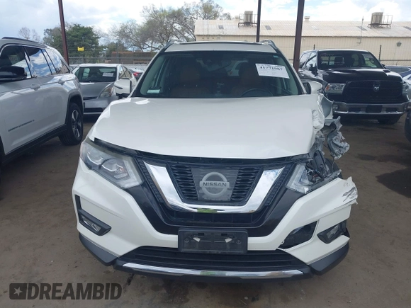 2017 Nissan Rogue SL with VIN JN8AT2MT7HW143035, listed as a IAAI auction lot 41771987 with 77,696 mi miles and . Bid and sale history available at DreamBid. Image 12.