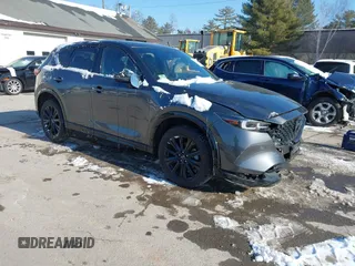 2022 Mazda CX-5 2.5 Turbo with VIN JM3KFBAY1N0526661, listed as a IAAI auction lot 41350659 with 22,963 mi miles and . Bid and sale history available at carsss.com. Image 1.