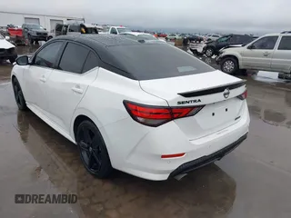 2023 Nissan Sentra SR z VIN 3N1AB8DV4PY277885, wystawiony jako IAAI lot #41553949 z przebiegiem 21 433 mil mil oraz . Historia ofert i sprzedaży dostępna na DreamBid. Obrazek 3.