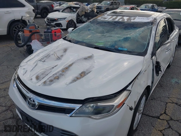 2015 Toyota Avalon Limited with VIN 4T1BK1EB0FU158712, listed as a IAAI auction lot 41436341 with 127,752 mi miles and . Bid and sale history available at DreamBid. Image 6.