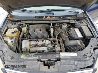 2005 Ford Five Hundred SE z VIN 1FAFP23135G175790, wystawiony jako Copart lot #56588085 z przebiegiem 117 354 mil mil oraz Szkody całkowita. Historia ofert i sprzedaży dostępna na DreamBid. Obrazek 11.