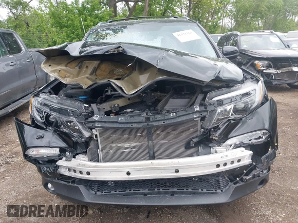 2018 Honda Pilot EX-L z VIN 5FNYF6H53JB009282, wystawiony jako IAAI lot #42331361 z przebiegiem 98 127 mil mil oraz . Historia ofert i sprzedaży dostępna na DreamBid. Obrazek 13.