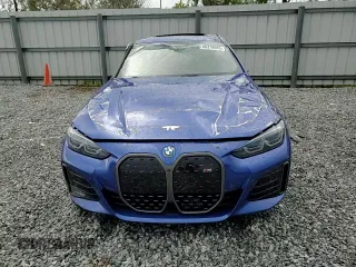 2024 BMW i4 M50 z VIN WBY33AW00RFS45178, wystawiony jako Copart lot #46379085 z przebiegiem Nie podano mil oraz Nie do naprawy • Non repairable. Historia ofert i sprzedaży dostępna na DreamBid. Obrazek 11.