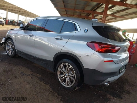 2021 BMW X2 sDrive28i with VIN WBXYH9C01M5S45641, listed as a IAAI auction lot 41688196 with 50,302 mi miles. Bid and sale history available at carsss.com. Image 3.