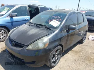 2007 Honda Fit with VIN JHMGD38447S027758, listed as a IAAI auction lot 42015742 with 201,611 mi miles. Bid and sale history available at carsss.com. Image 2.
