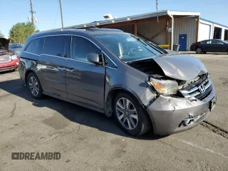 2016 Honda Odyssey Touring Elite with VIN 5FNRL5H91GB092214, listed as a Copart auction lot 61158745 with 121,477 mi miles and Salvage title. Bid and sale history available at DreamBid. Image 4.