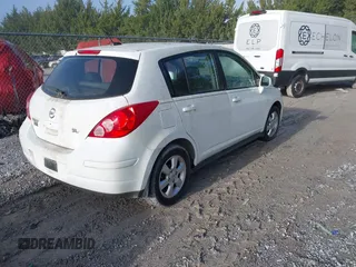 2009 Nissan Versa 1.8 SL with VIN 3N1BC13E09L421457, listed as a IAAI auction lot 41865283 with 195,313 mi miles. Bid and sale history available at carsss.com. Image 4.