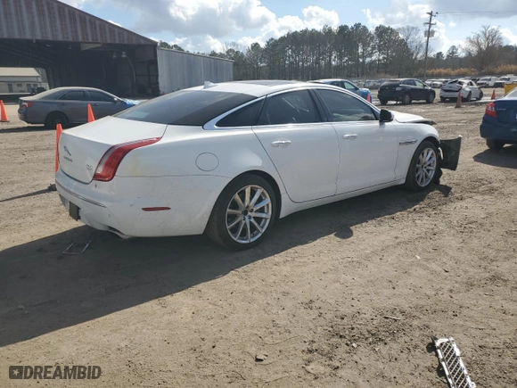 2013 Jaguar XJ with VIN SAJWJ1CD1D8V51865, listed as a Copart auction lot 44382125 with NaN miles and Salvage Title. Bid and sale history available at carsss.com. Image 3.