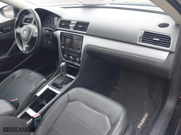 2012 Volkswagen Passat SE with VIN 1VWBP7A38CC033611, listed as a IAAI auction lot 41855933 with 155,429 mi miles. Bid and sale history available at carsss.com. Image 5.