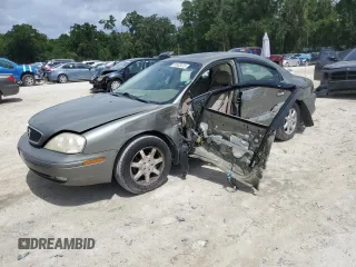 2003 Mercury Sable LS Premium z VIN 1MEFM55S83A604592, wystawiony jako Copart lot #58505415 z przebiegiem 119 684 mil mil oraz Szkoda całkowita • Salvage title. Historia ofert i sprzedaży dostępna na DreamBid. Obrazek 1.