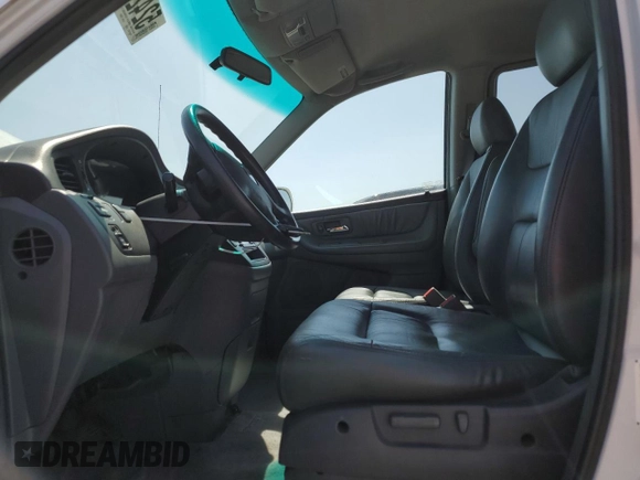 2004 Honda Odyssey EX-L with VIN 5FNRL18974B092979, listed as a Copart auction lot 52429055 with 106,515 mi miles and Clean Title. Bid and sale history available at DreamBid. Image 7.