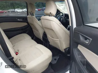 2015 Ford Edge SE z VIN 2FMTK4G87FBC18076, wystawiony jako IAAI lot #42536718 z przebiegiem 180 790 mil mil oraz . Historia ofert i sprzedaży dostępna na DreamBid. Obrazek 8.