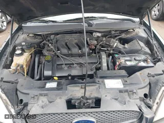 2003 Ford Taurus SEL Deluxe with VIN 1FAHP56S83A243290, listed as a IAAI auction lot 41743609 with 206,399 mi miles. Bid and sale history available at carsss.com. Image 10.