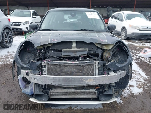 2020 MINI Hardtop Cooper S z VIN WMWXR5C07L2L60692, wystawiony jako IAAI lot #41621462 z przebiegiem 66 898 mil mil oraz . Historia ofert i sprzedaży dostępna na DreamBid. Obrazek 13.