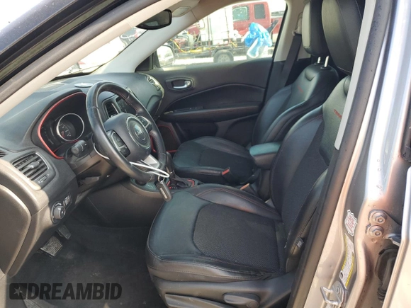 2019 Jeep Compass Trailhawk with VIN 3C4NJDDB9KT668858, listed as a Copart auction lot 58603645 with 74,226 mi miles and Salvage title. Bid and sale history available at DreamBid. Image 7.