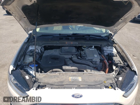 2015 Ford Fusion SE Hybrid z VIN 3FA6P0LU8FR105615, wystawiony jako Copart lot #61451155 z przebiegiem 106 778 mil mil oraz Szkoda całkowita • Salvage title. Historia ofert i sprzedaży dostępna na DreamBid. Obrazek 11.