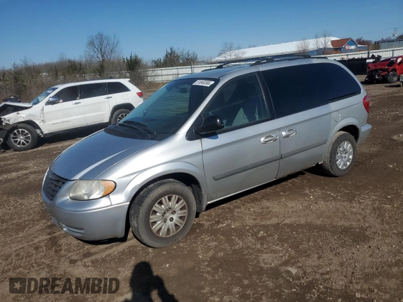 2007 Chrysler Town & Country SWB with VIN 1A4GJ45R17B157622, listed as a Copart auction lot 51040395 with 157,075 mi miles and Salvage Title. Bid and sale history available at carsss.com. Image 1.