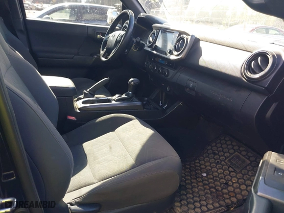 2016 Toyota Tacoma SR5 with VIN 5TFDZ5BN7GX001869, listed as a IAAI auction lot 40610002 with 184,380 mi miles. Bid and sale history available at carsss.com. Image 5.