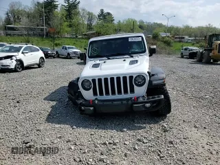 2021 Jeep Gladiator Rubicon с VIN 1C6JJTBG8ML527146, выставлен на аукционе Copart как лот 55036755 с пробегом 77 695 миль миль и Списание • Salvage title. История ставок и продаж доступна на DreamBid. Изображение 14.