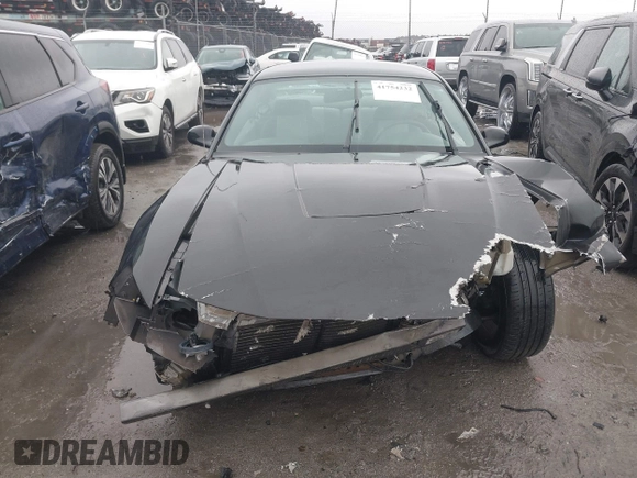 2004 Ford Mustang Standard z VIN 1FAFP40414F105171, wystawiony jako IAAI lot #41754232 z przebiegiem Nie podano mil oraz . Historia ofert i sprzedaży dostępna na DreamBid. Obrazek 12.