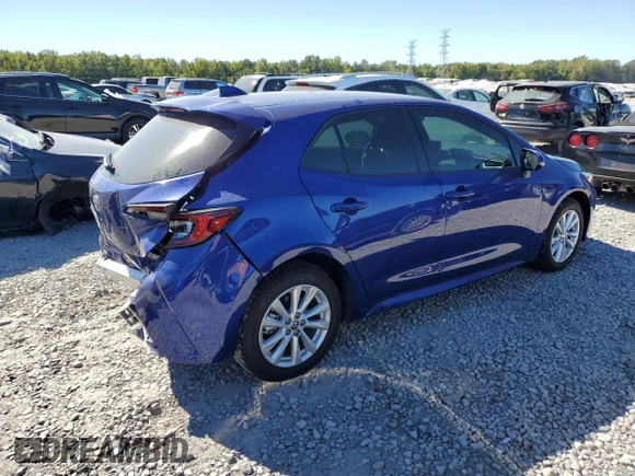 2024 Toyota Corolla Hatchback SE with VIN JTND4MBE3R3230872, listed as a Copart auction lot 76112324 with 6,882 mi miles and Salvage Title. Bid and sale history available at carsss.com. Image 3.