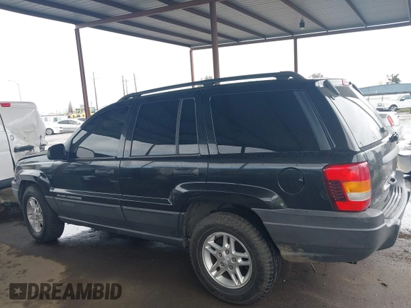 2004 Jeep Grand Cherokee Laredo z VIN 1J4GX48N94C435700, wystawiony jako IAAI lot #41809624 z przebiegiem 147 413 mil mil oraz . Historia ofert i sprzedaży dostępna na DreamBid. Obrazek 14.