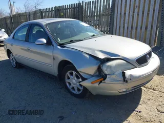 2003 Mercury Sable LS Premium z VIN 1MEHM55S33A628713, wystawiony jako IAAI lot #41838553 z przebiegiem 56 755 mil mil oraz . Historia ofert i sprzedaży dostępna na DreamBid. Obrazek 1.