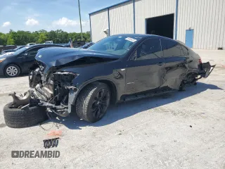 2014 BMW X6 xDrive35i z VIN 5UXFG2C57E0H11289, wystawiony jako Copart lot #50985425 z przebiegiem 123 811 mil mil oraz Szkoda całkowita • Salvage title. Historia ofert i sprzedaży dostępna na DreamBid. Obrazek 1.