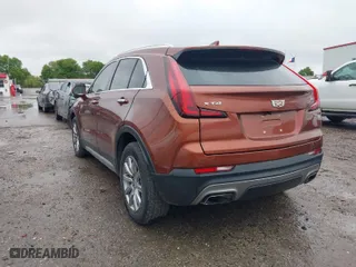 2019 Cadillac XT4 FWD Premium Luxury with VIN 1GYFZCR48KF208483, listed as a IAAI auction lot 41869450 with 65,318 mi miles. Bid and sale history available at carsss.com. Image 3.