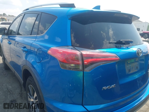 2018 Toyota RAV4 XLE with VIN JTMWFREVXJJ751586, listed as a IAAI auction lot 42586337 with 55,821 mi miles and . Bid and sale history available at DreamBid. Image 3.