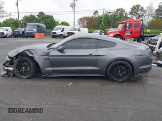 2021 Ford Mustang GT z VIN 1FA6P8CF0M5105060, wystawiony jako IAAI lot #41967671 z przebiegiem 27 626 mil mil oraz . Historia ofert i sprzedaży dostępna na DreamBid. Obrazek 14.